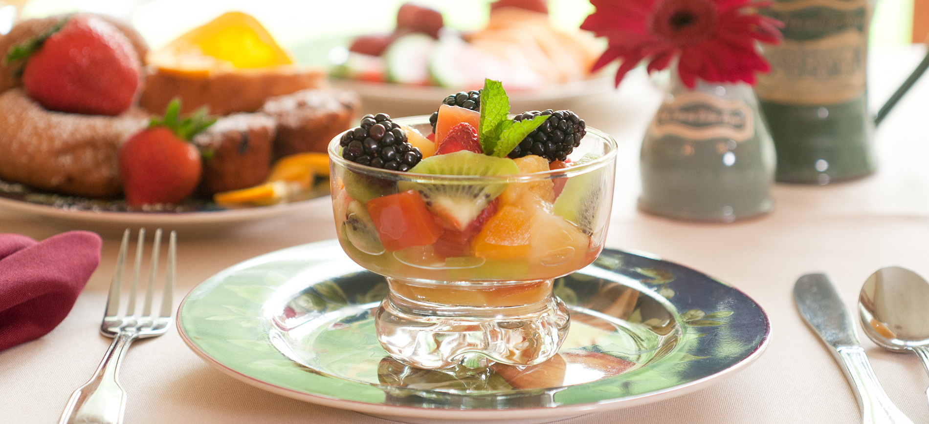 Fruit cup in glass bowl on plate