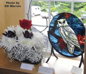 Art in Bloom 2011 owl in stained glass and floral arrangement