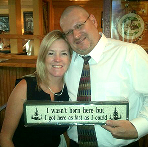 Mary and John holding sign