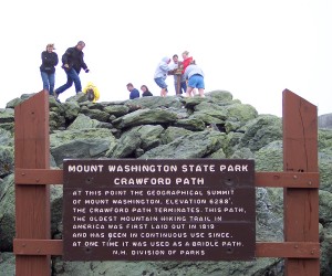 hikers & sign at summit