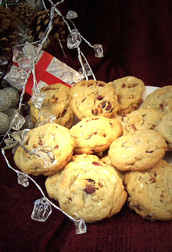 Riverstones cookies with icicyle string & silver present with red ribbon behind